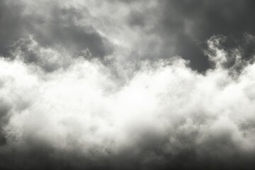Obraz premium Dramatic gray and white clouds. Dense, ominous cloud formation. Heavy weather approaching