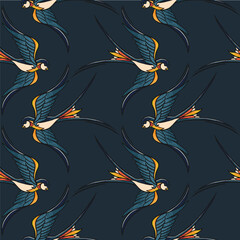 Seamless pattern with flying swallows in traditional tattoo style on dark background. Bold lines, vintage color palette
