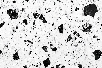 Abstract textured surface with scattered dark fragments on a light background.  A seamless pattern of fragmented elements