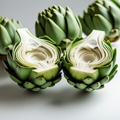 vibrant fresh artichokes halves on table for healthy cooking