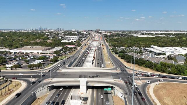 Austin Texas Interstate 35 highway construction and skyline 4k aerial drone video