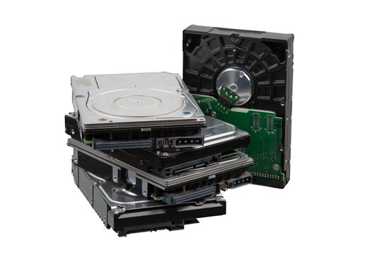 Stack of old hard disk drives and opened HDD case, isolated on transparent background. - Powered by Adobe