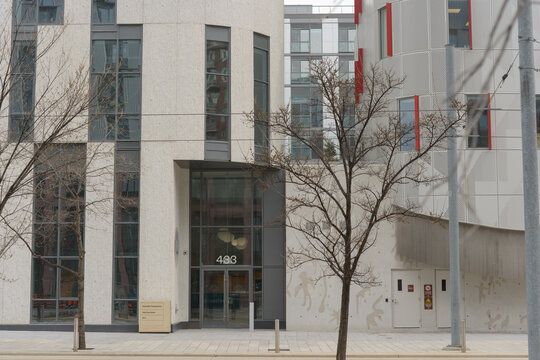 exterior entrance of Miziwe Biik Training Institute, part of an Indigenous Hub, located at 433 Cherry St in Toronto, Canada