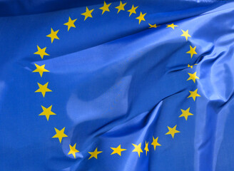Close-up of the flag of the EU, European Union, fluttering in the wind, wave pattern