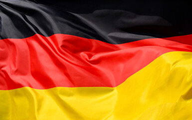 Close-up of the national flag of Germany fluttering in the wind, wave pattern