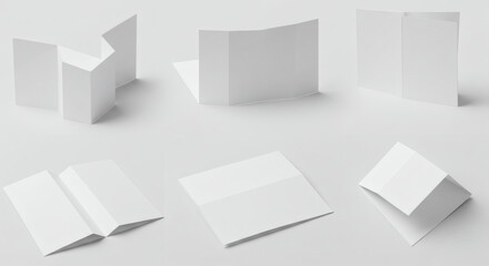 Six white paper mockups showcasing different folding styles against a light background, useful for presenting brochure or flyer designs.