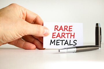 Rare earth metals symbol. Concept words Rare earth metals on beautiful white card. Beautiful white...