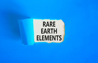 Rare earth elements symbol. Concept words Rare earth elements on beautiful white paper. Beautiful blue paper background. Business and rare earth elements concept. Copy space.