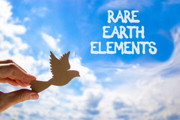 Rare earth elements symbol. Concept words Rare earth elements. Beautiful blue sky clouds...
