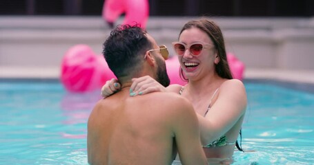 Swimming pool, smile and couple on holiday, laugh or hug outdoor for talking on vacation. Happy, man and woman in water with swimsuit for romantic love, spinning or playful dance on date to relax