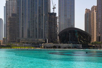 the dubai opera building behind the famous fountain at Burj Khalifa area