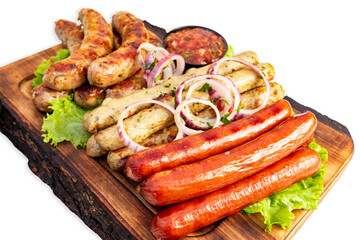 Grilled sausages served on a wooden platter with vegetables