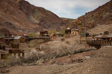 Historic Ghost Town in Rugged Desert Landscape