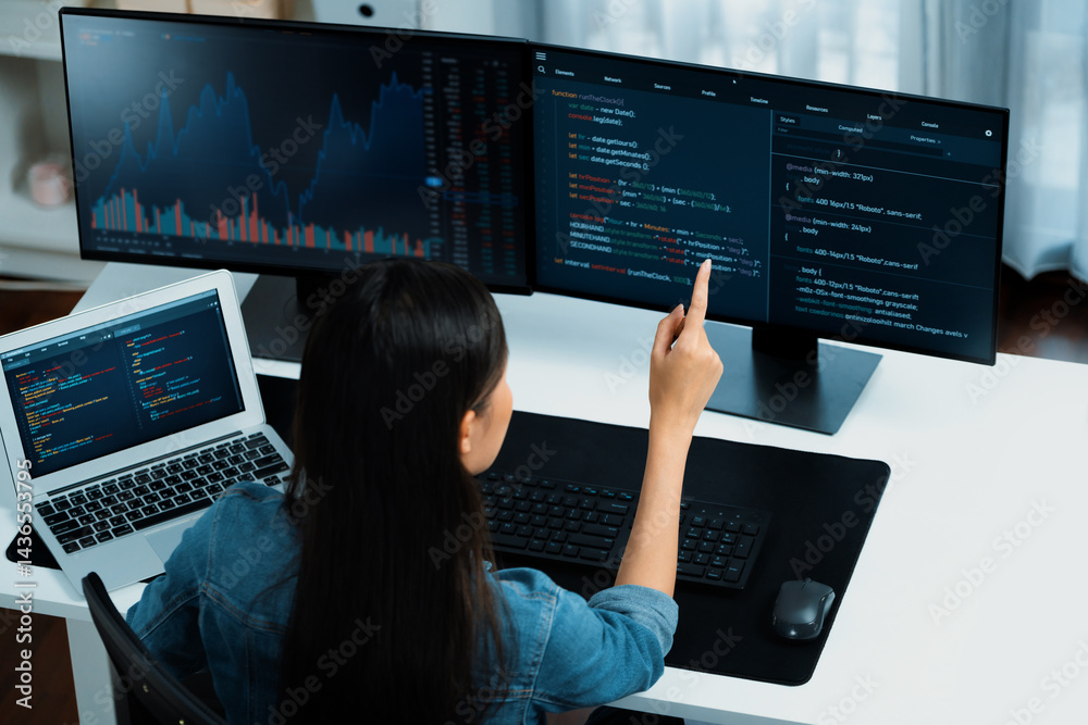 Poster top view young asian it developer creating with typing online information on pc with coding program 
