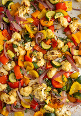 Close up of Roasted Vegetable Salad with Fresh Herbs and Sprouts