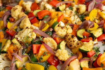 Close up of Roasted Vegetable Salad with Fresh Herbs and Sprouts