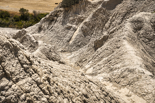 Detail of structures of eroded hills of Komolithi earth pyramids on the island of Crete