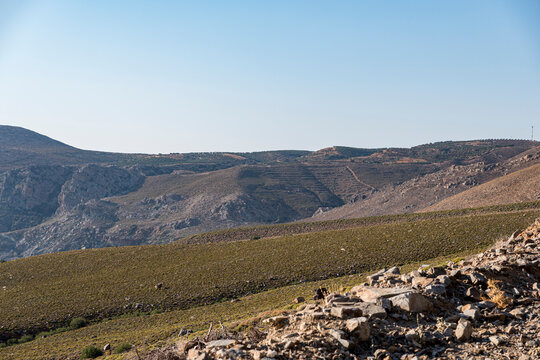 Mountainous landscape covered with sparse flora in Mediterranean region