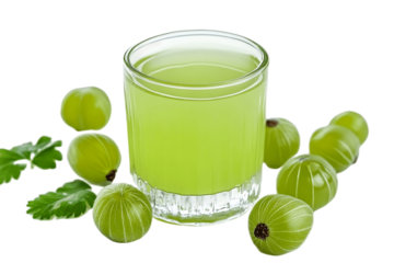 Light green gooseberry juice served in a glass.