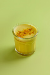 Vibrant and Flavorful Turmeric Golden Milk Served in a Clear