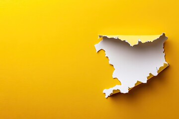 Ripped yellow paper with white hole