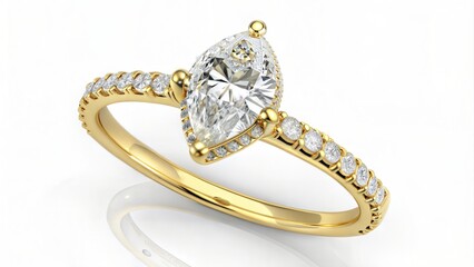 Yellow engagement ring with a pear-cut diamond. (Jewelry)