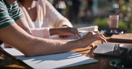 Outdoor, hands and university student with laptop on internet for research, assignment and essay writing. People, campus and group work at college with studying for exams or assessment as classmates