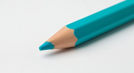 Turquoise Colored Pencil Close Up on White Background for Creative Projects