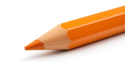 Obraz premium Orange Colored Pencil Close-Up on White Background for Art Supplies
