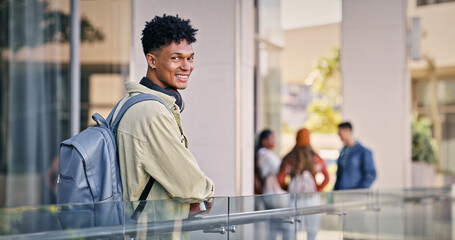 Man, college student and happy outdoor with pride for education, progress and study in Cuba. Male person, university learner and outside with smile on portrait in confidence for learning on campus
