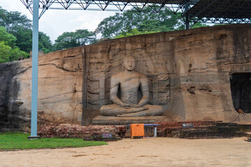 Gal Vihara, four magnificent Buddha statues carved from a single granite slab in ancient Polonnaruwa, Sri Lanka