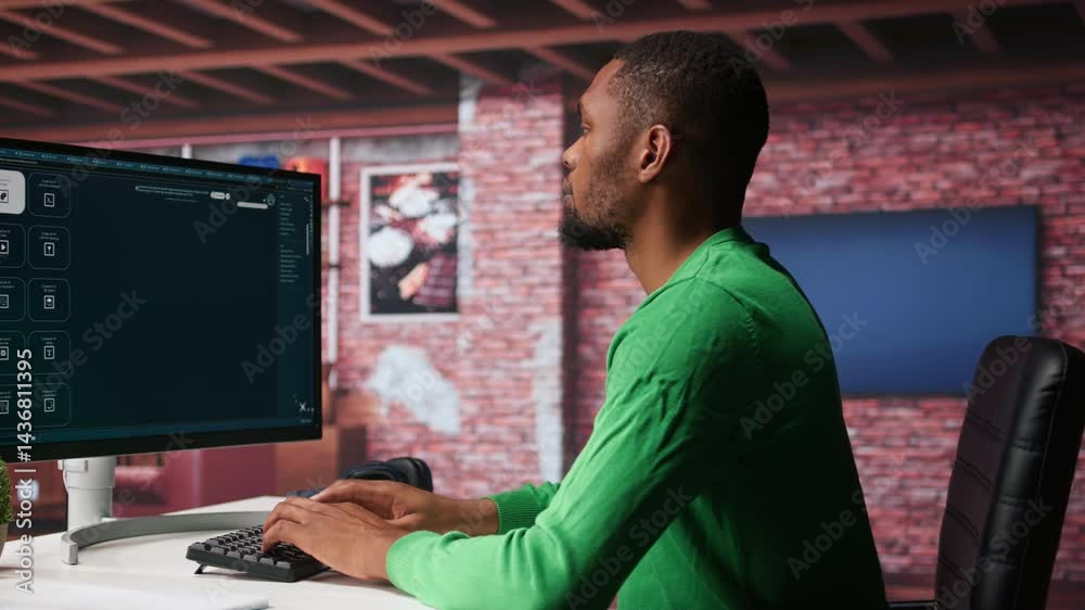 Fototapete Black graphic designer working in loft with AI image generator software. Digital screen displaying visuals created through machine learning and cloud computing, generative AI. Camera B.