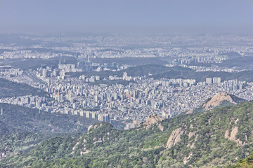 Fototapeta premium Seoul Skyline As Seen from Bukhansan National Park During the Day