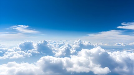 Breathtaking Aerial View of Fluffy White Clouds against Blue Sky
