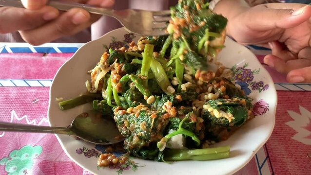 Pecel or mixed steamed vegetables. traditional food from Central Java, indonesia.