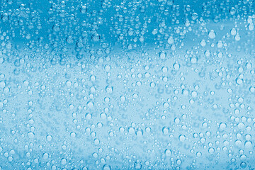 Soda water with bubbles as background, closeup