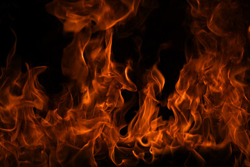 Fire blaze flames on black background. Fire burn flame isolated, abstract texture. Flaming explosion effect with burning fire.