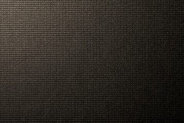 網目状の質感のある焦茶色の紙の背景テクスチャー