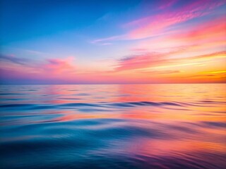 Obraz premium Serene Dawn Seascape: Pastel Sky, Calm Ocean, Tilt-Shift Photography