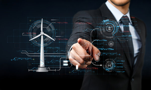 Businessman interacting with digital interface featuring wind turbine graphic and futuristic data visualization for renewable energy solutions