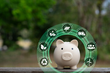 A piggy bank surrounded by eco-friendly symbols represents the concept of sustainable finance and...