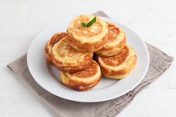 Kue Kamir. Kamir cake. served on a white plate. with copy space. originated from Pemalang, Middle Java, Indonesia.