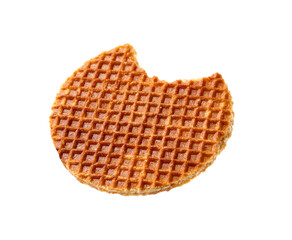 Bitten round Dutch waffle isolated on white