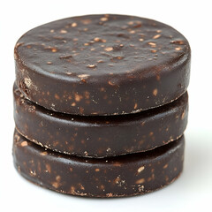 Stacked dark brown round cookies stack