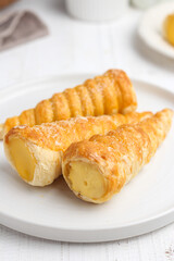 Kue cumcum. Horn pastry or cone pastry with vanilla cream.