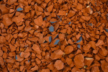 Small pieces of broken red sandstone