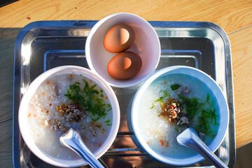 A beautifully presented breakfast of porridge and eggs.