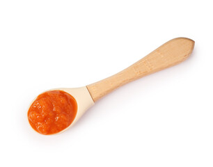 Baby food. Tasty puree in spoon isolated on white, top view