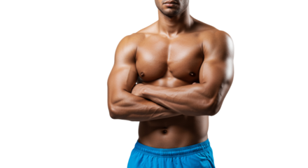 A muscular man with his arms crossed wearing blue shorts against a transparent background