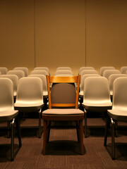 Obraz premium Introvert Shyness A single chair pulled slightly away from a group, symbolizing a desire for personal space and quiet Chair slightly apart, Introversion, social detachment